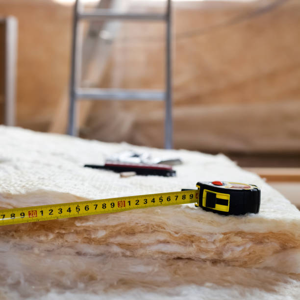 istock Measure tape and knife on mineral wool 805436560