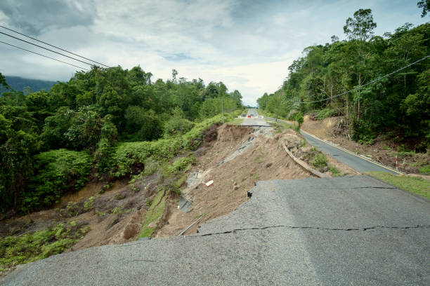 istock Asphalt Cracked Road Collapsed by Landslide 805467796