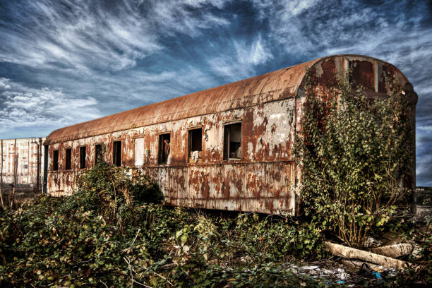 Train Abandoned old locomotive on the railroad siding