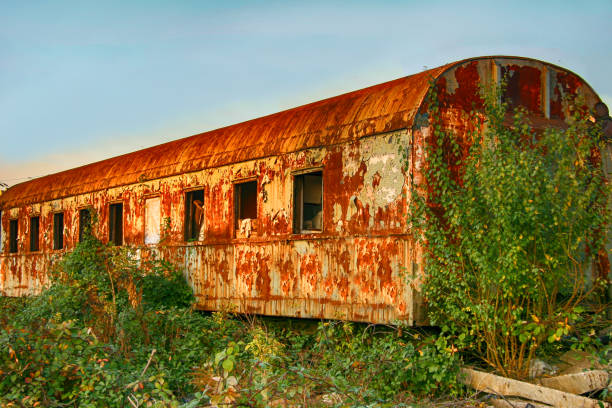istock Abandoned old locomotive on the railroad siding 805486560