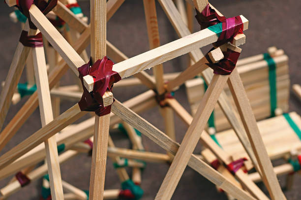 Construction from wooden slats connected by duct tape - architecture concept