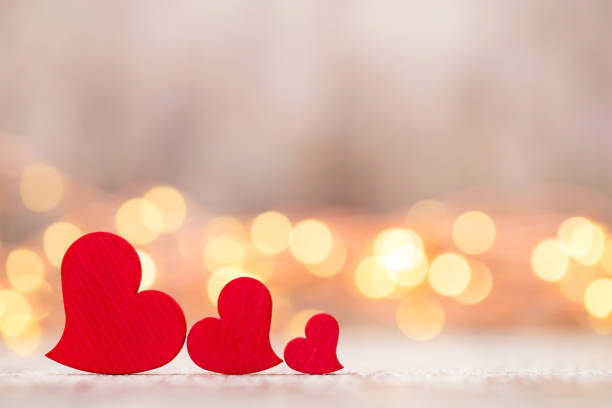 istock Red hearts on the wooden background. 805526116