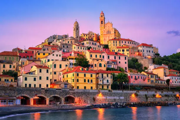 Dramatic sunset over medieval town Cervo on italian Riviera, Liguria, Italy