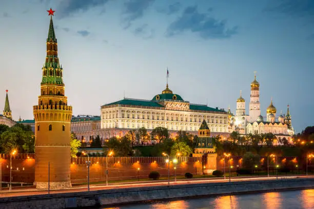 Beautiful illuminated famous Kremlin in Moscow at Twilight - Night. The official residence of the president of the Russian Federation. Moscow, Russia.