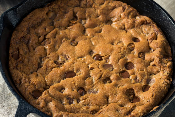 istock Hot Homemade Chocolate Chip Skillet Cookie 805634486
