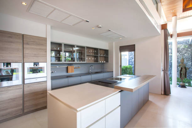 istock luxury interior design pool villa in kitchen area which feature island counter and built in furniture 805650806