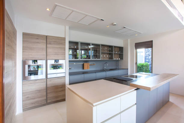 istock luxury interior design pool villa in kitchen area which feature island counter and built in furniture 805650910