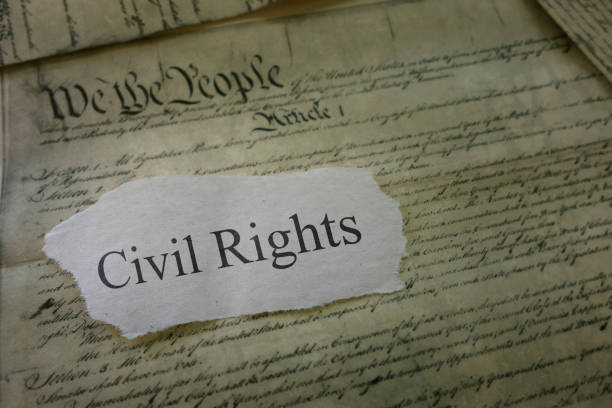 Civil Rights concept Civil Rights newspaper headline on a copy of the US Constitution civil rights photos stock pictures, royalty-free photos & images