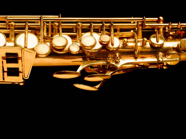 istock Golden saxophone on dark background 805686286