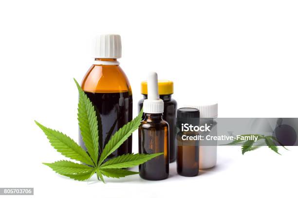 Marijuana And Cannabis Oil Bottles Isolated Stock Photo - Download Image Now - Cannabis Plant, Cannabis - Narcotic, Crude Oil