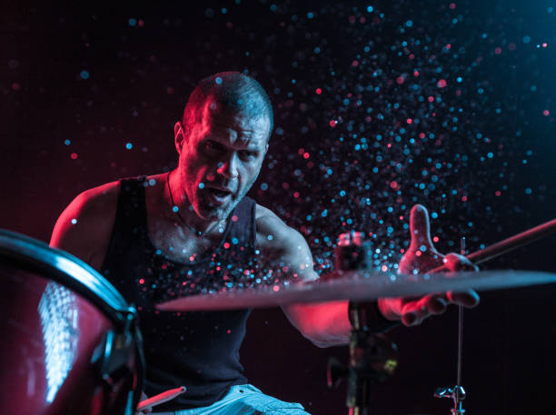 istock Rock N Roll Drummer Sparkles In The Air 805760622