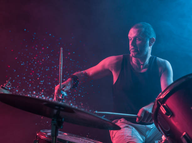 istock Rock N Roll Drummer Sparkles In The Air 805760800