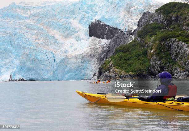 Single And Double Kayaks In Blackstone Bay Near Glacier Alaska Stock Photo - Download Image Now