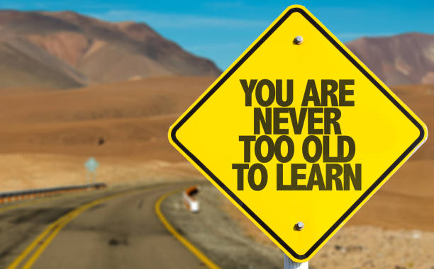 You Are Never to Old to Learn You Are Never to Old to Learn road sign never stock pictures, royalty-free photos & images