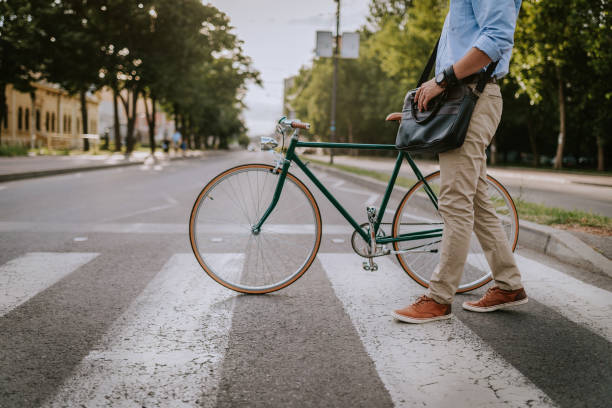 istock Crossing the Street with the bicycle 805803342