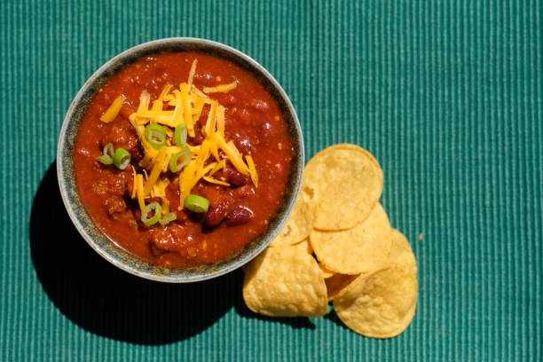 istock Bowl of Chili with Chips and Garnish 805810336