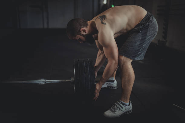 istock Young man in the gym 805891220