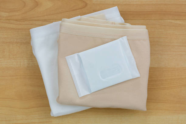istock New unused Sanitary napkins (sanitary towel, sanitary pad, menstrual pad) on underwear 805906524