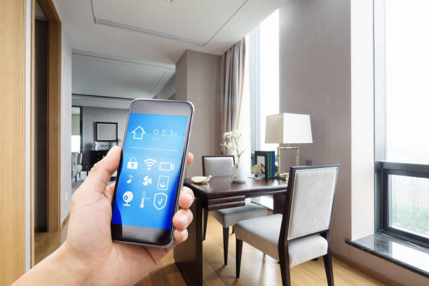 istock mobile phone with living room in smart home 805925008