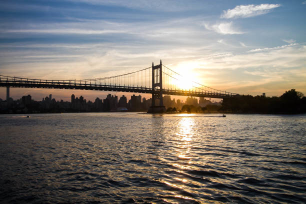 istock Triborough bridge over the river and sunset, New York 805977160