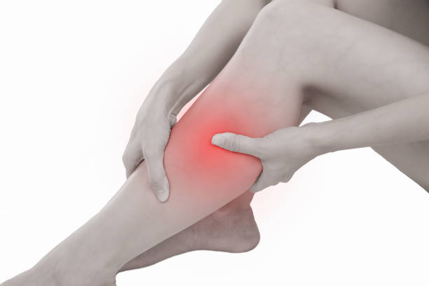 istock Woman with calf feeling pain on white background. 806015408