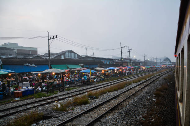 istock Morning train market in thailand 806040562