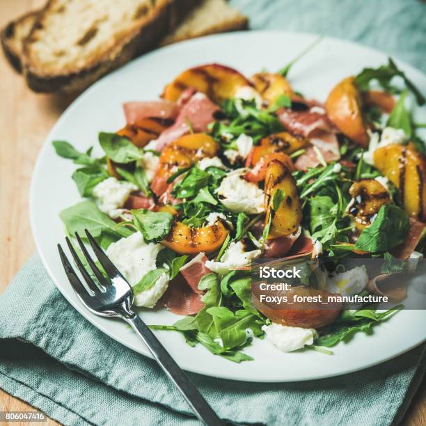 Arugula Prosciutto Mozzarella And Grilled Peach Salad Stock Photo - Download Image Now