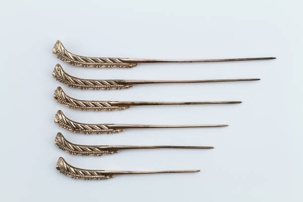 Old Thai rusty grunge ancient copper alloy  hairpin on white background