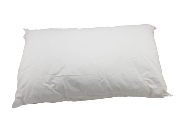 istock Close up of white pillow on white background 806070336