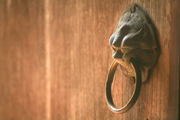istock Brass hanging wooden door 806075110