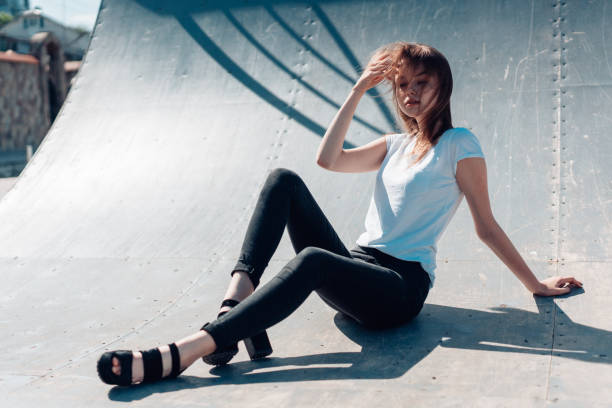 istock beautiful young girl posing on the playground 806092746