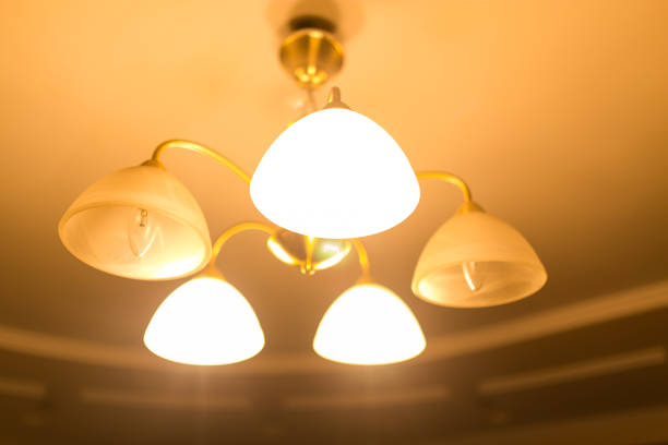 istock Burning lamps in a chandelier 806163038