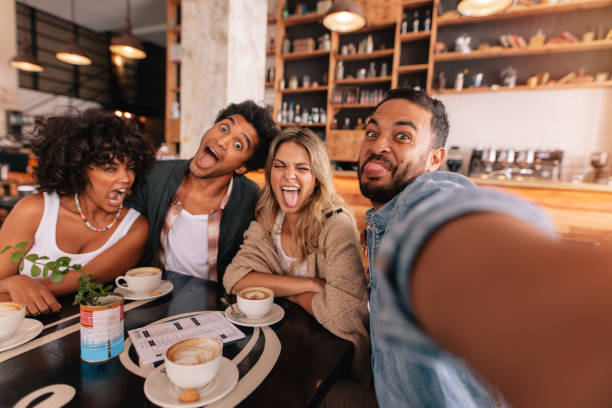 istock Friends making selfie with funny faces 806165456