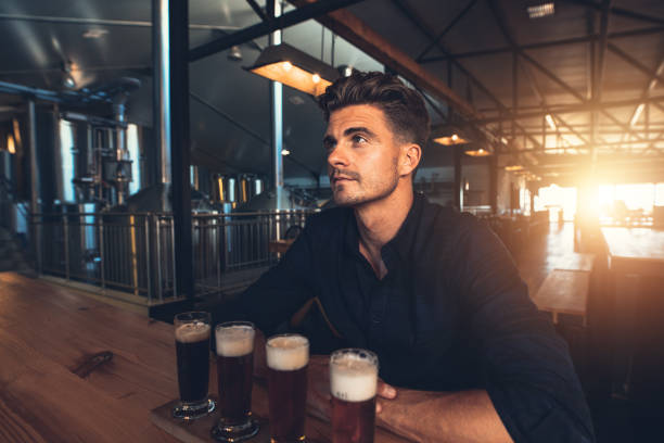 istock Man tasting different types of beer at the brewery 806170302