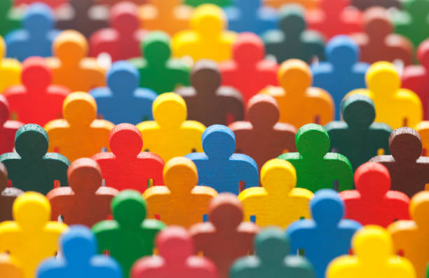 istock Colorful painted group of people figures 806170888