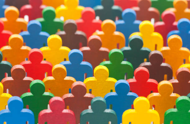 istock Colorful painted group of people figures 806170906
