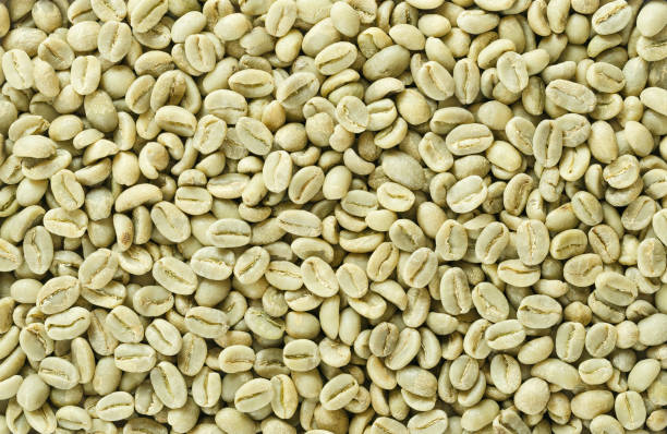 istock Unroasted green Arabica coffee beans flat surface 806173024