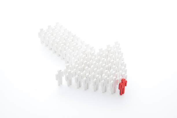 istock People figure in arrow shape with the leader in front 806176116