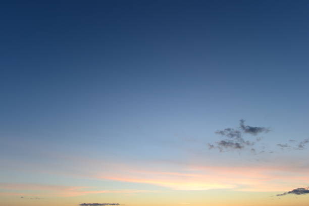 istock Clear blue sky with a bright pink glow from the sunset 806194638