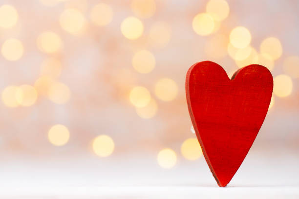 istock Red hearts the bokeh background. Valentine Day background. 806202656