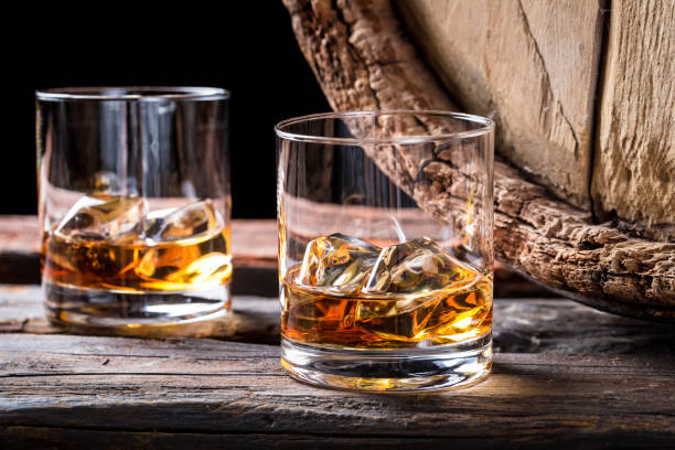 istock Old and tasty cognac with ice and oak barrel 806204830