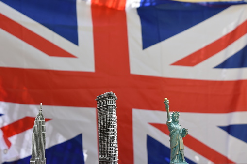 The Statue of Liberty AND Flatiron Building AND Empire State Building ON  England flag