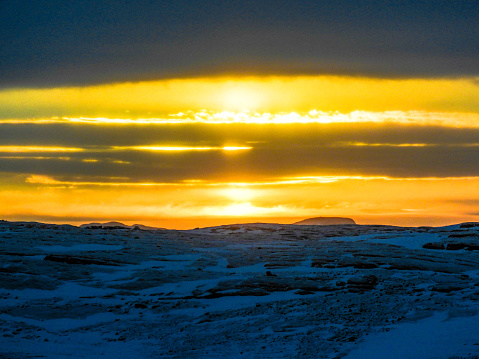 These photos are taken at Larsemann hills , Antarctica during the month of april.The scenic beauty of clouds and sun during evening is just awesome.