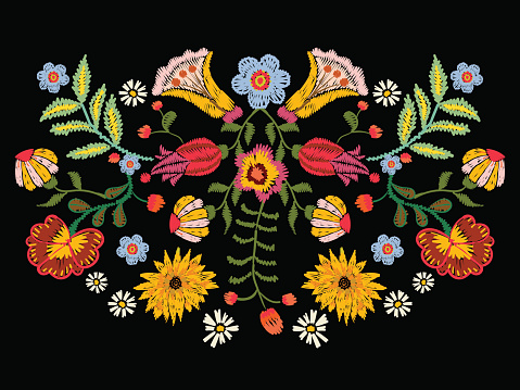 Embroidery ethnic pattern with colorful flowers. Vector traditional floral bouquet. Tribal style design for fashion wearing.