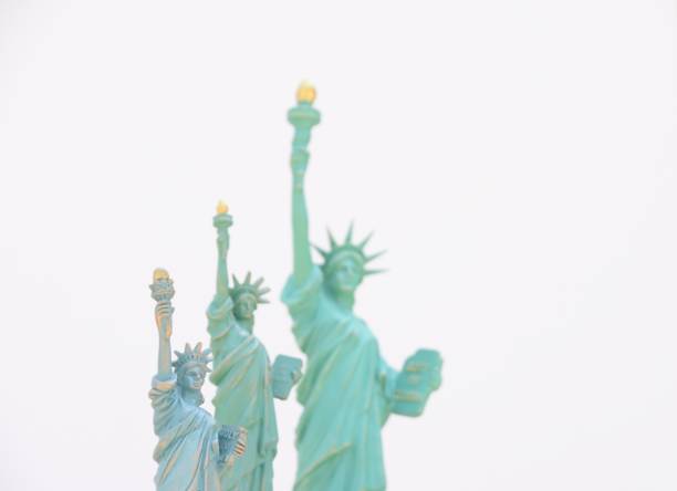 istock Statues of Liberty on a white background 806230836