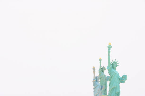 istock Statues of Liberty on a white background 806233260