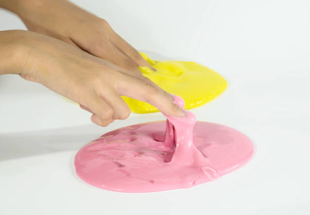 istock Kid Playing Hand Made Toy Called Slime, Selective focus on Slime 806236300