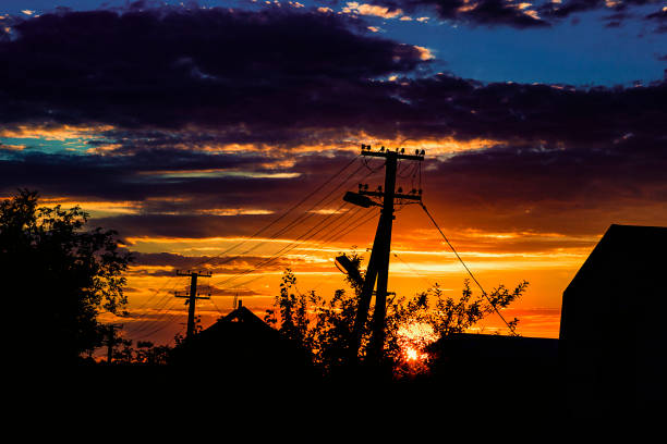 istock Houses silhouette over a beautiful sunset 806242334