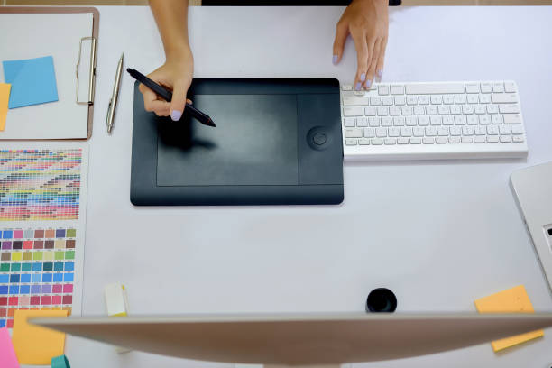 istock Young photographer and graphic designer at work in office. 806258806