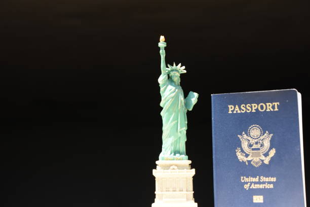 istock Statue of Liberty with an American passport 806289920